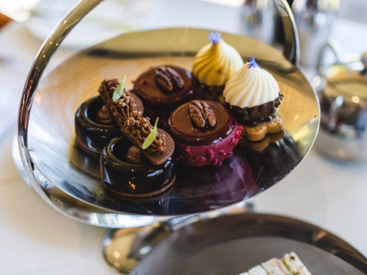 Fonab Castle | Cakes on cake stand and sandwiches during afternoon tea at luxury spa hotel in Scotland ?? Fonab Castle